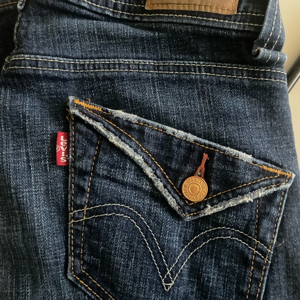 Levi’s low-rise distressed jeans